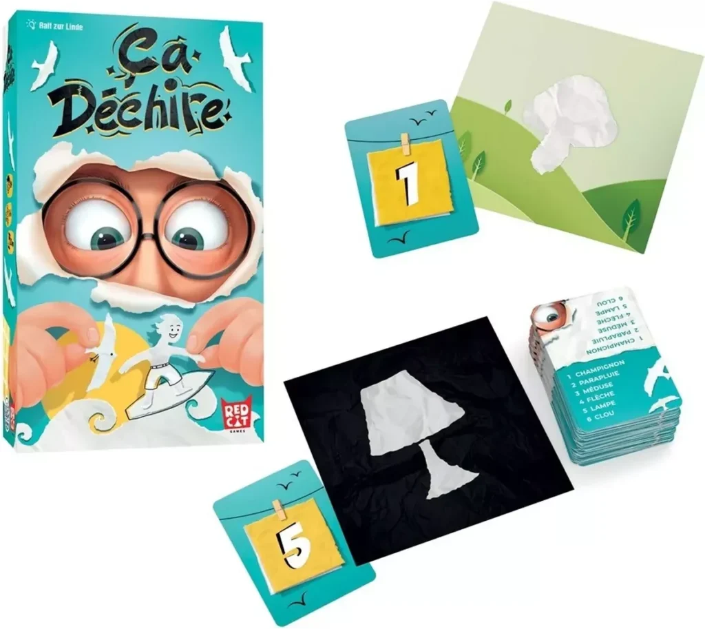 Matériel du jeu avec des cartes de mots, des cartes numérotés et des formes en papier déchiré